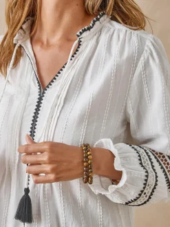 Femme Daxon Blouse raffinée fantaisie